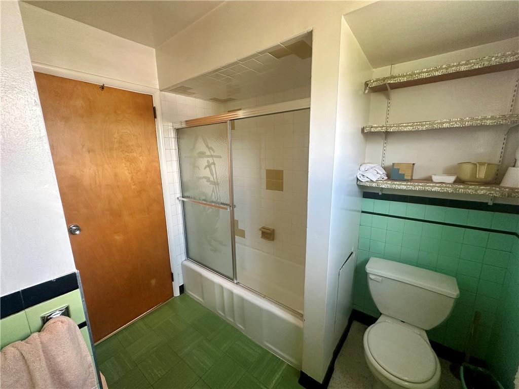 741 Frederick Street McKees Rocks, PA 15136 - Photo 13 of 18 a bathroom with a toilet and a shower