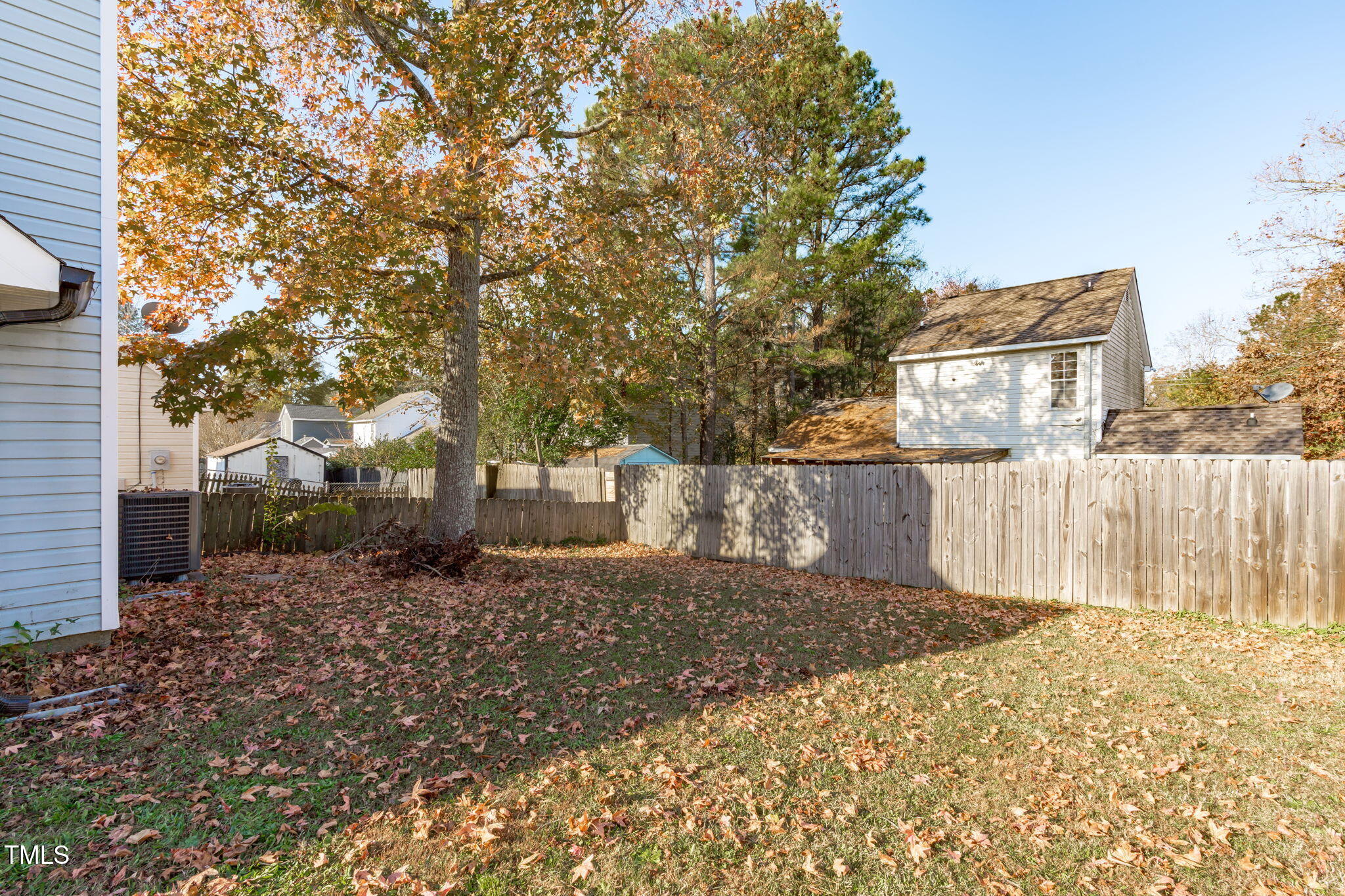 605 Stratton Way Durham, NC 27704 - Photo 25 of 46 a view of a house with a yard