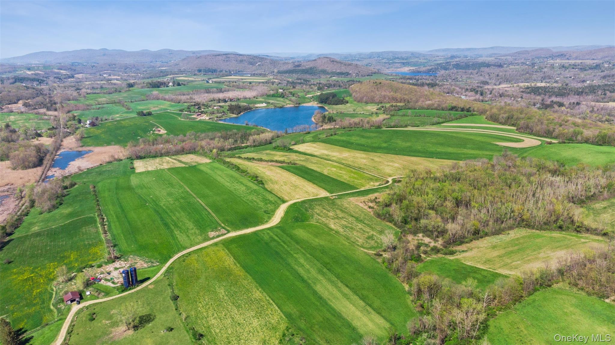 156 Sharon Station Road Amenia, NY 12501 - Photo 4 of 18 a view of a field with an ocean