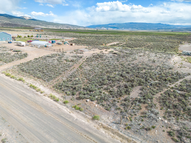 1400 East Highline Road, Unit 1 Loa, UT 84747 - Photo 7 of 17 View of rural area featuring a mountain backdrop