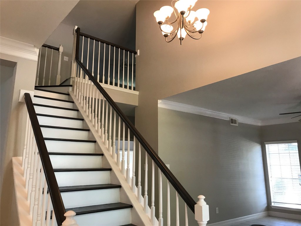 5722 Fort Sumter Lane Houston, TX 77084 - Photo 11 of 22 a view of entryway and hall with wooden floor