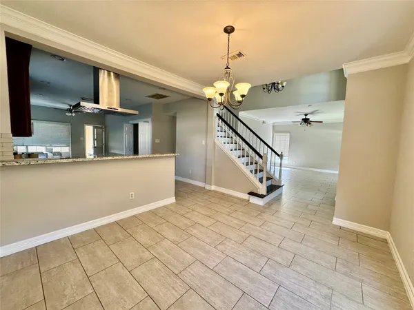 a view of a livingroom with a staircase