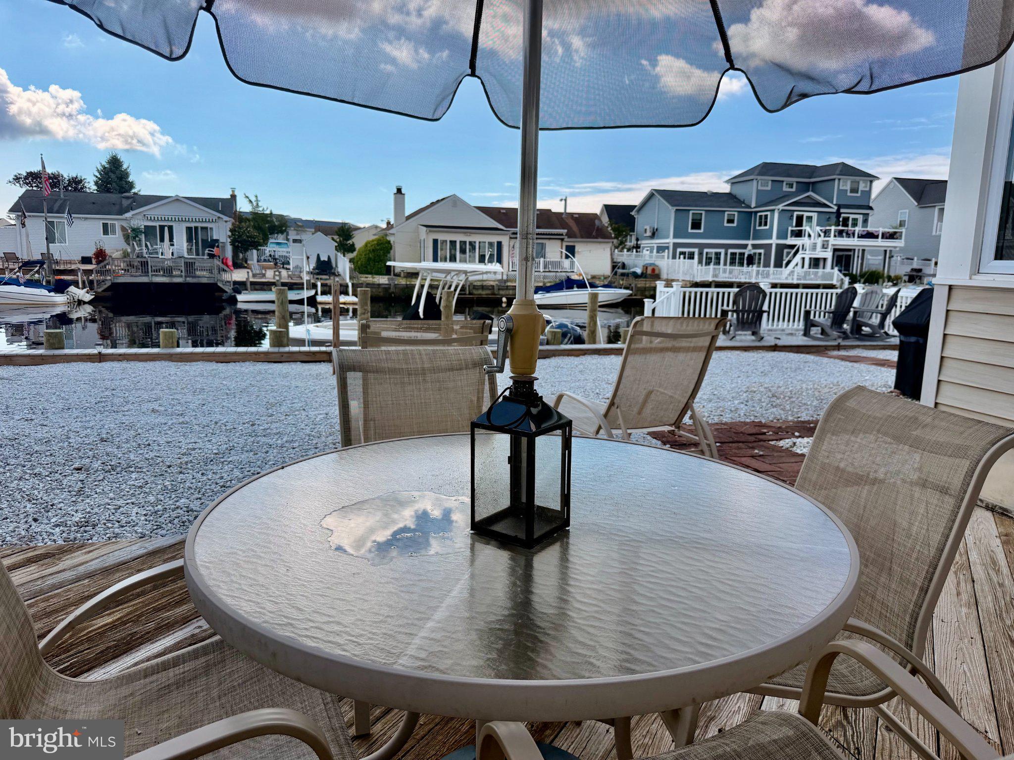 211 William Cook Boulevard Manahawkin, NJ 08050 - Photo 59 of 71 Serene waterfront dining retreat.