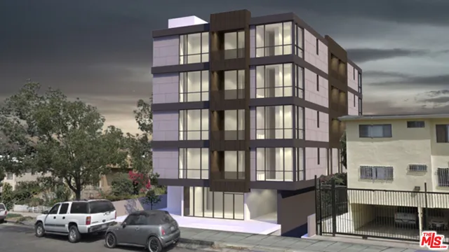 a view of a car park in front of a building