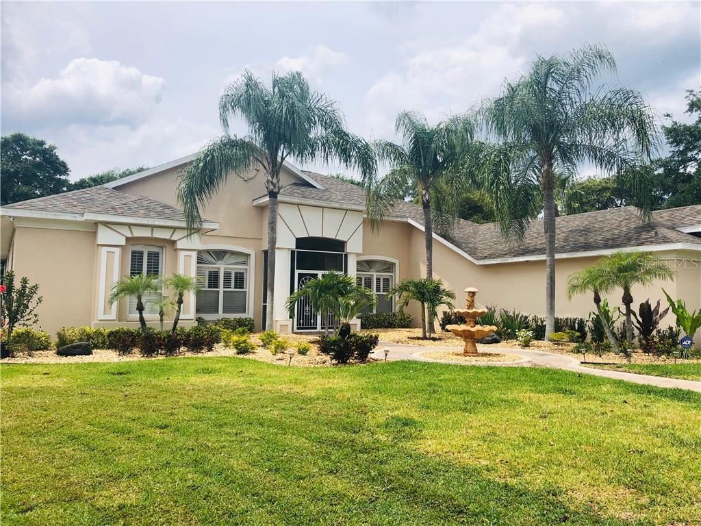 a front view of a house with patio