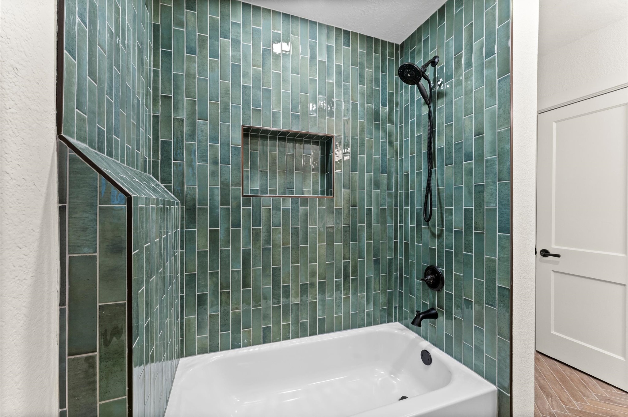3725 Griggs Road Houston, TX 77021 - Photo 21 of 37 Beautiful guest bathroom tub/shower combo and herringbone floors.