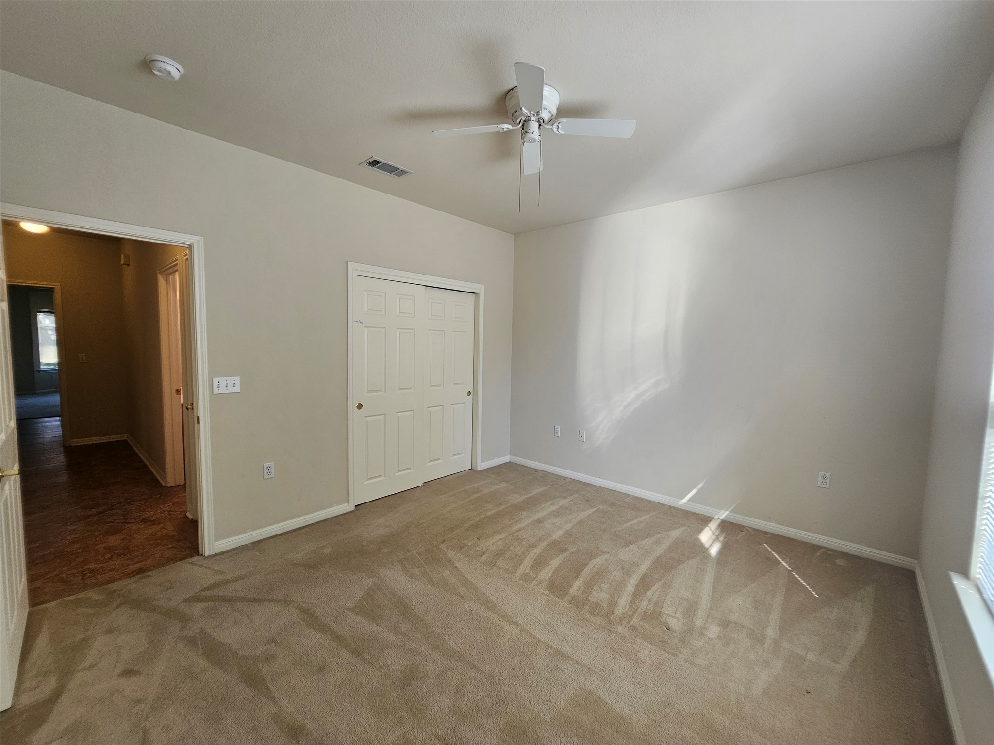 211 Red Poppy Trail Georgetown, TX 78633 - Photo 18 of 35 wooden floor in an empty room