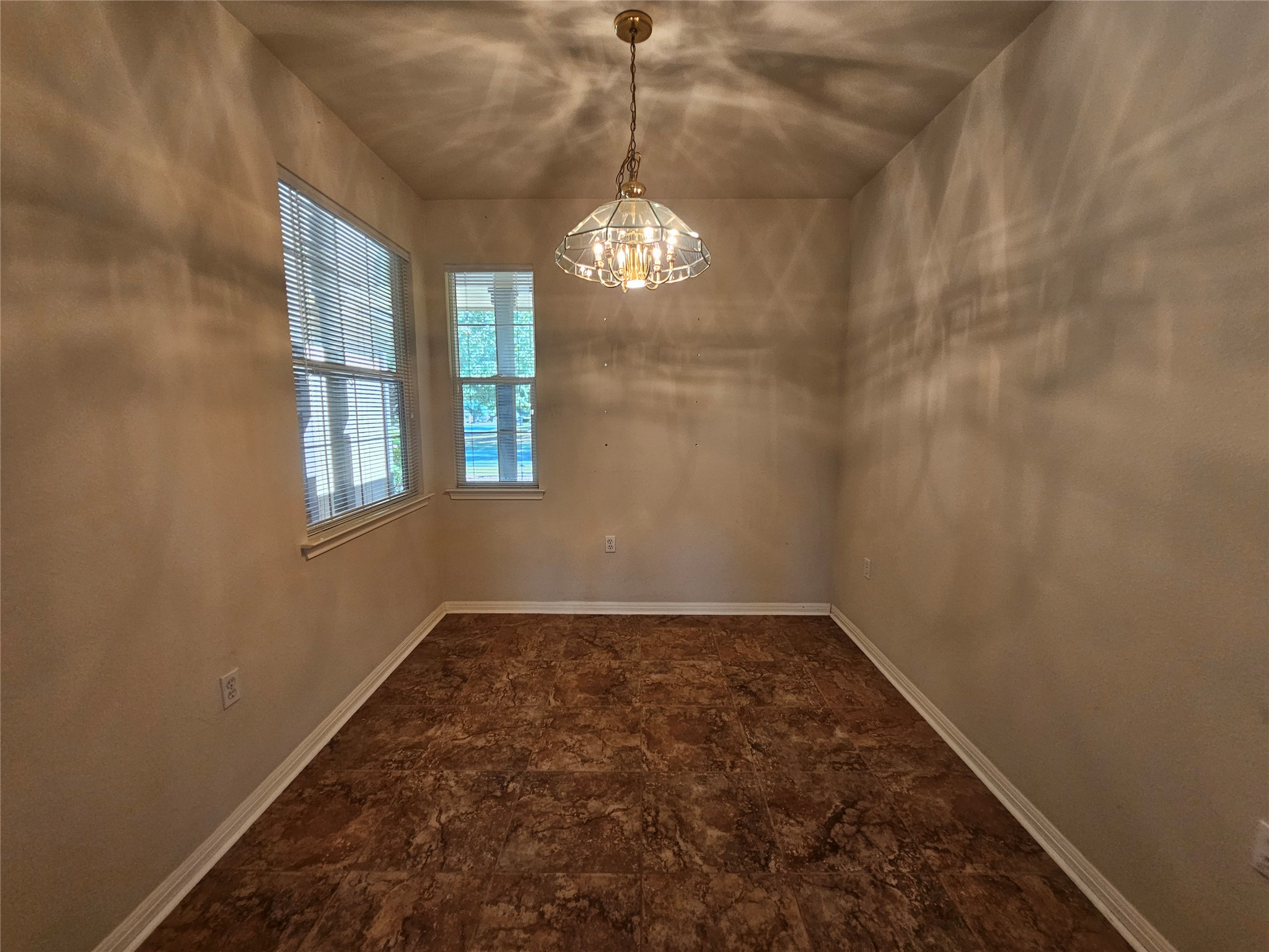 211 Red Poppy Trail Georgetown, TX 78633 - Photo 21 of 35 a view of an empty room with windows