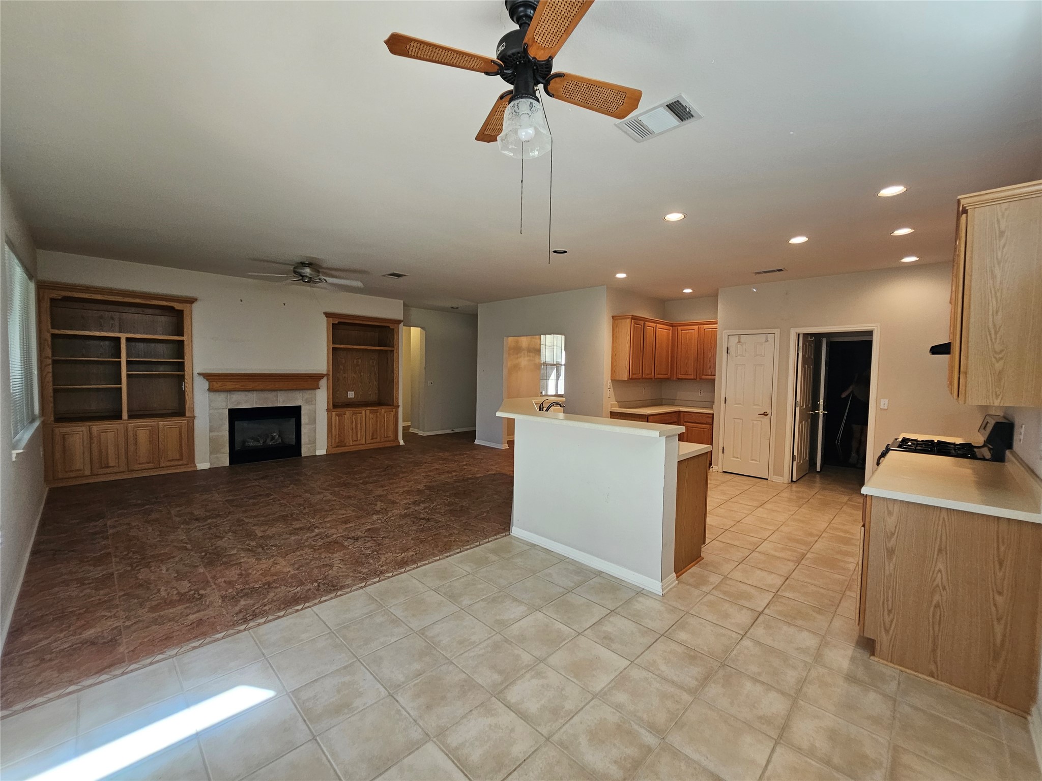 211 Red Poppy Trail Georgetown, TX 78633 - Photo 34 of 35 a large kitchen with cabinets table and chairs