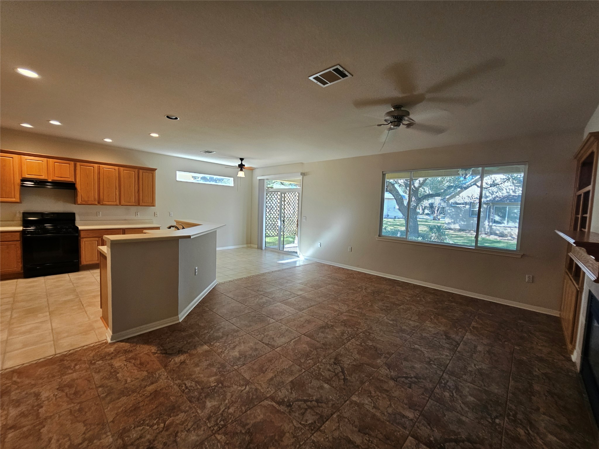211 Red Poppy Trail Georgetown, TX 78633 - Photo 35 of 35 a view of kitchen with stainless steel appliances granite countertop a refrigerator a oven a sink with island and windows