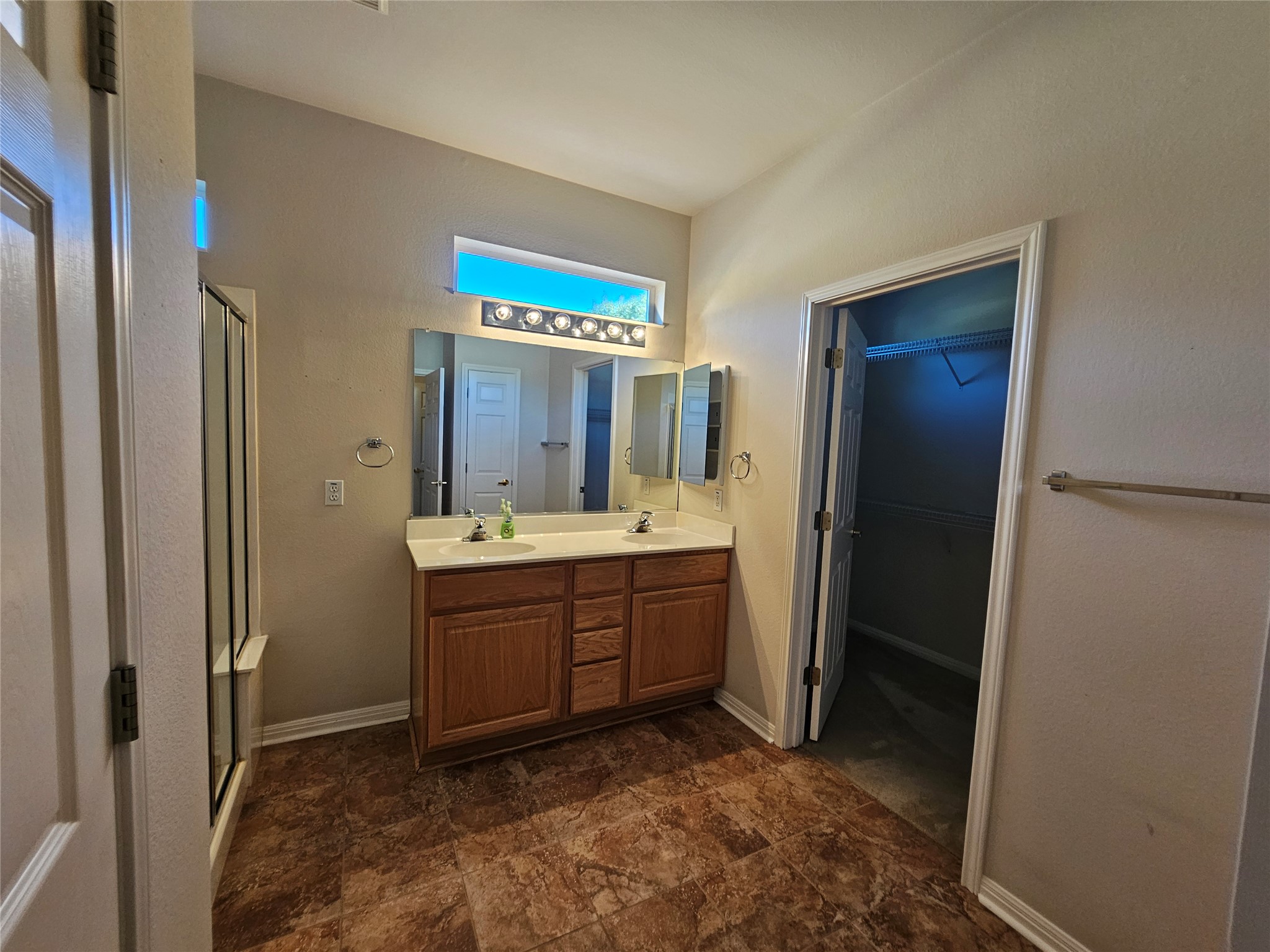 211 Red Poppy Trail Georgetown, TX 78633 - Photo 9 of 35 a bathroom with a sink and a mirror