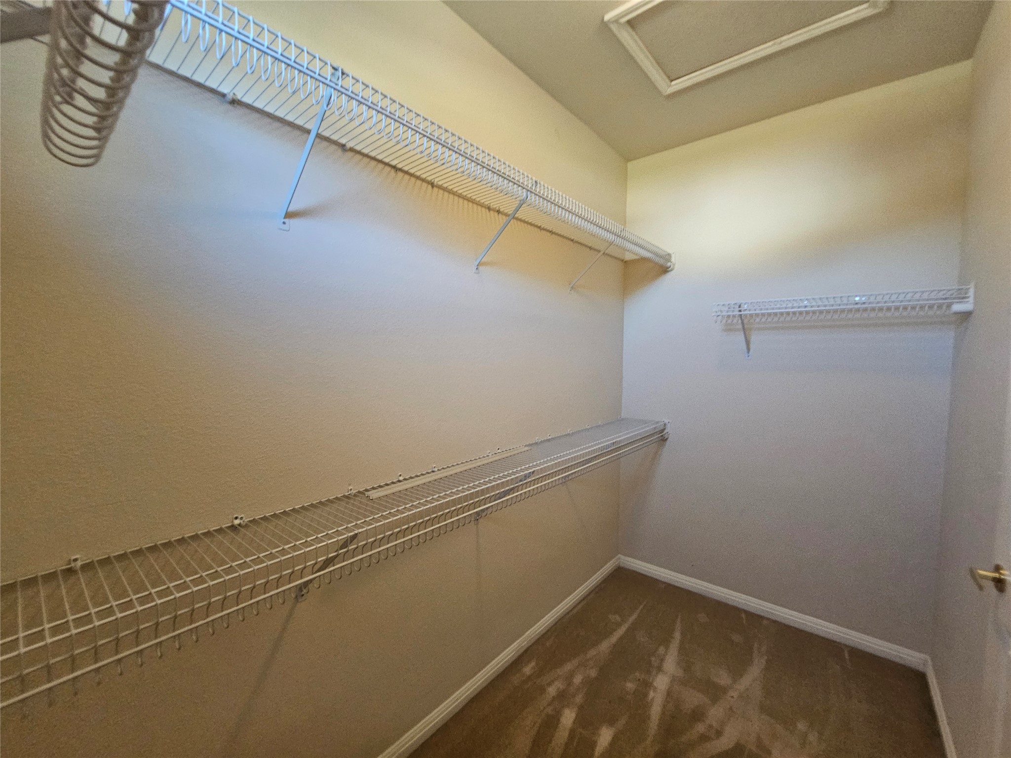 211 Red Poppy Trail Georgetown, TX 78633 - Photo 10 of 35 a view of a room with racks on the wall