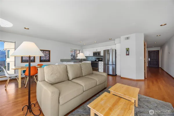 a living room with furniture and a table
