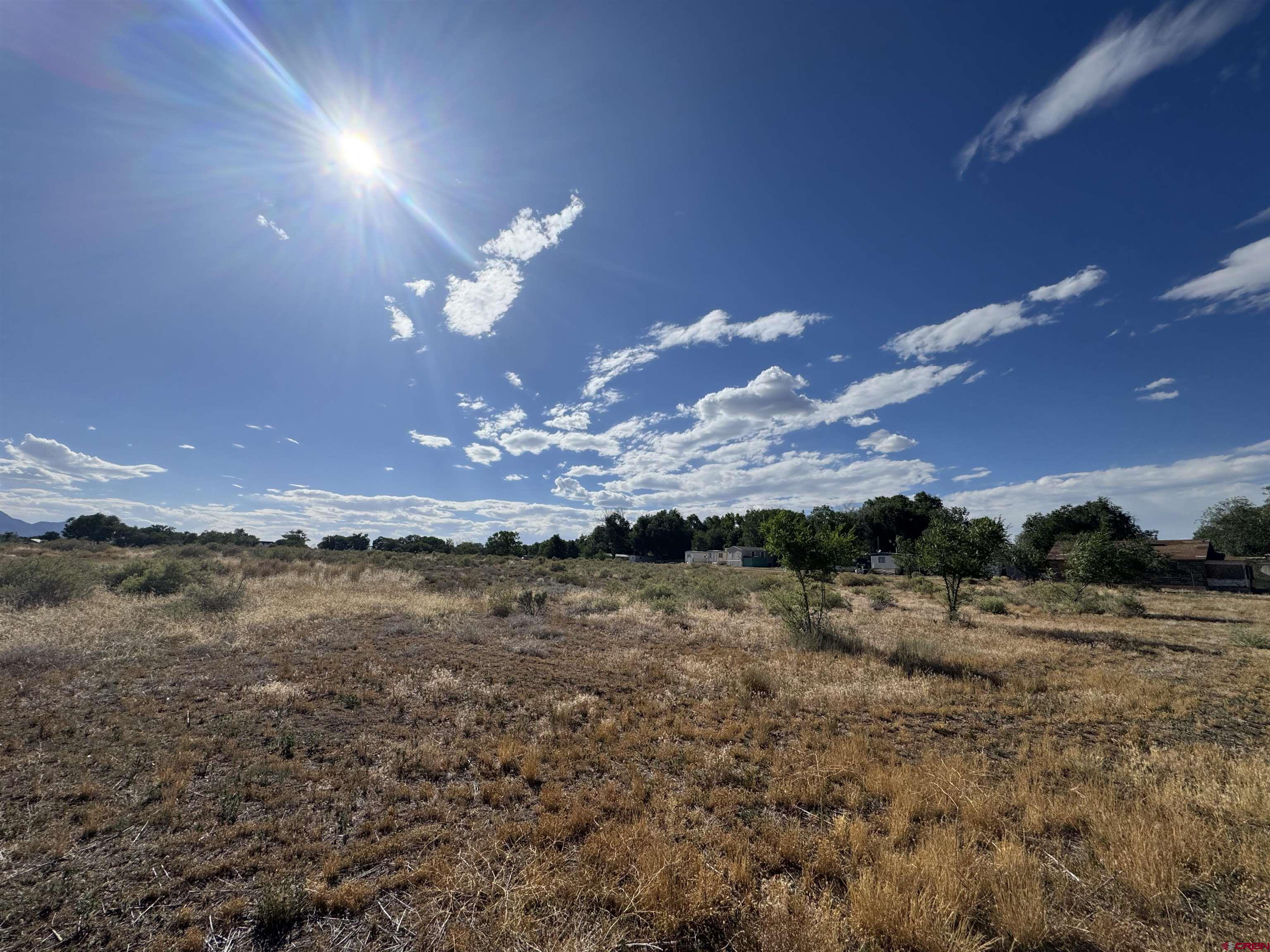 821 South Chestnut Street Cortez, CO 81321 - Photo 2 of 9 a view of a lake with a mountain