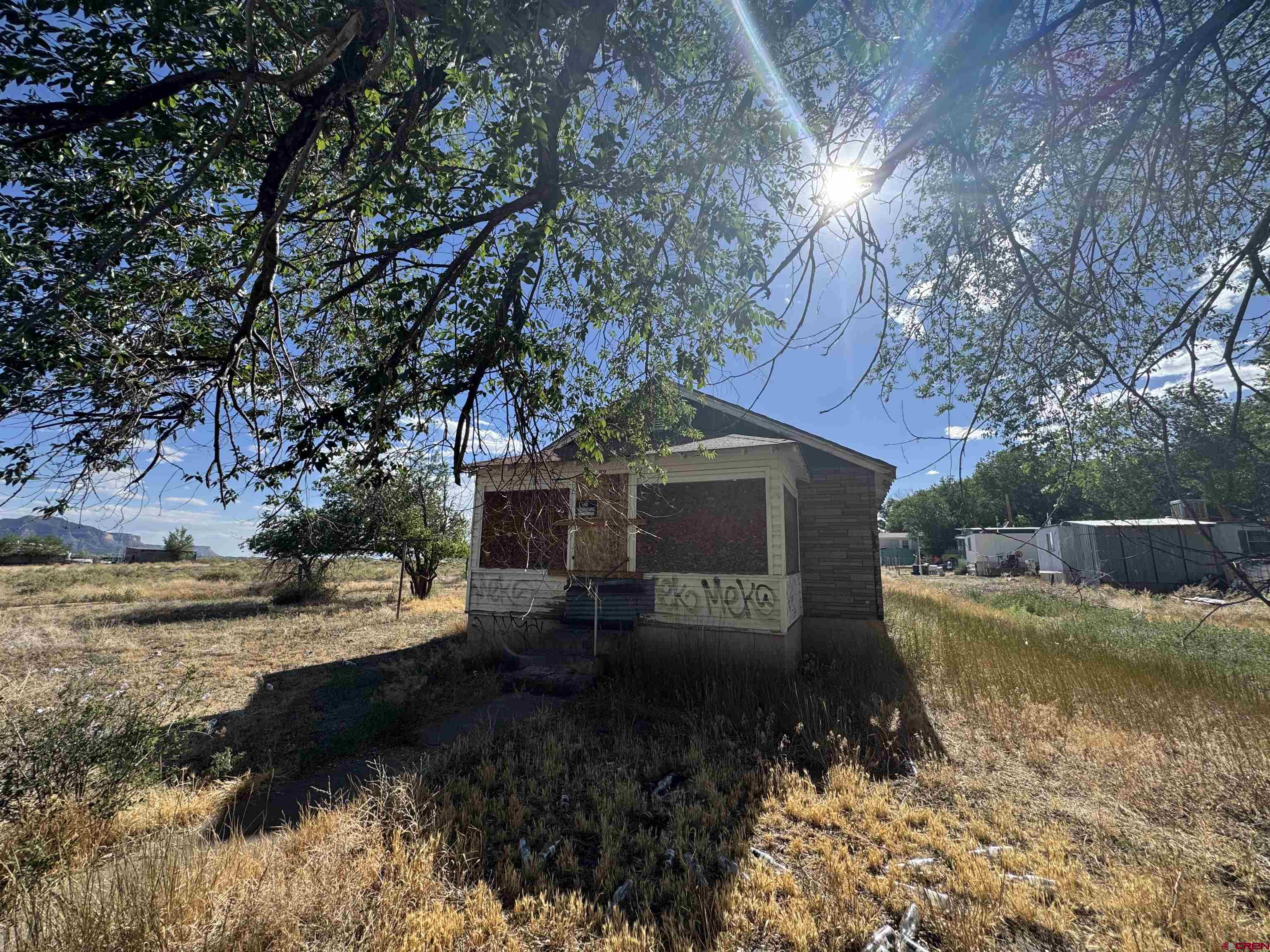 821 South Chestnut Street Cortez, CO 81321 - Photo 3 of 9 a view of a house with a yard
