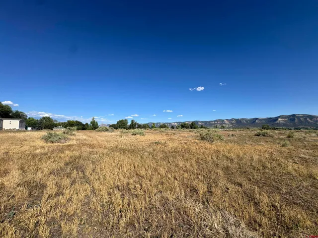 a view of an ocean and mountain