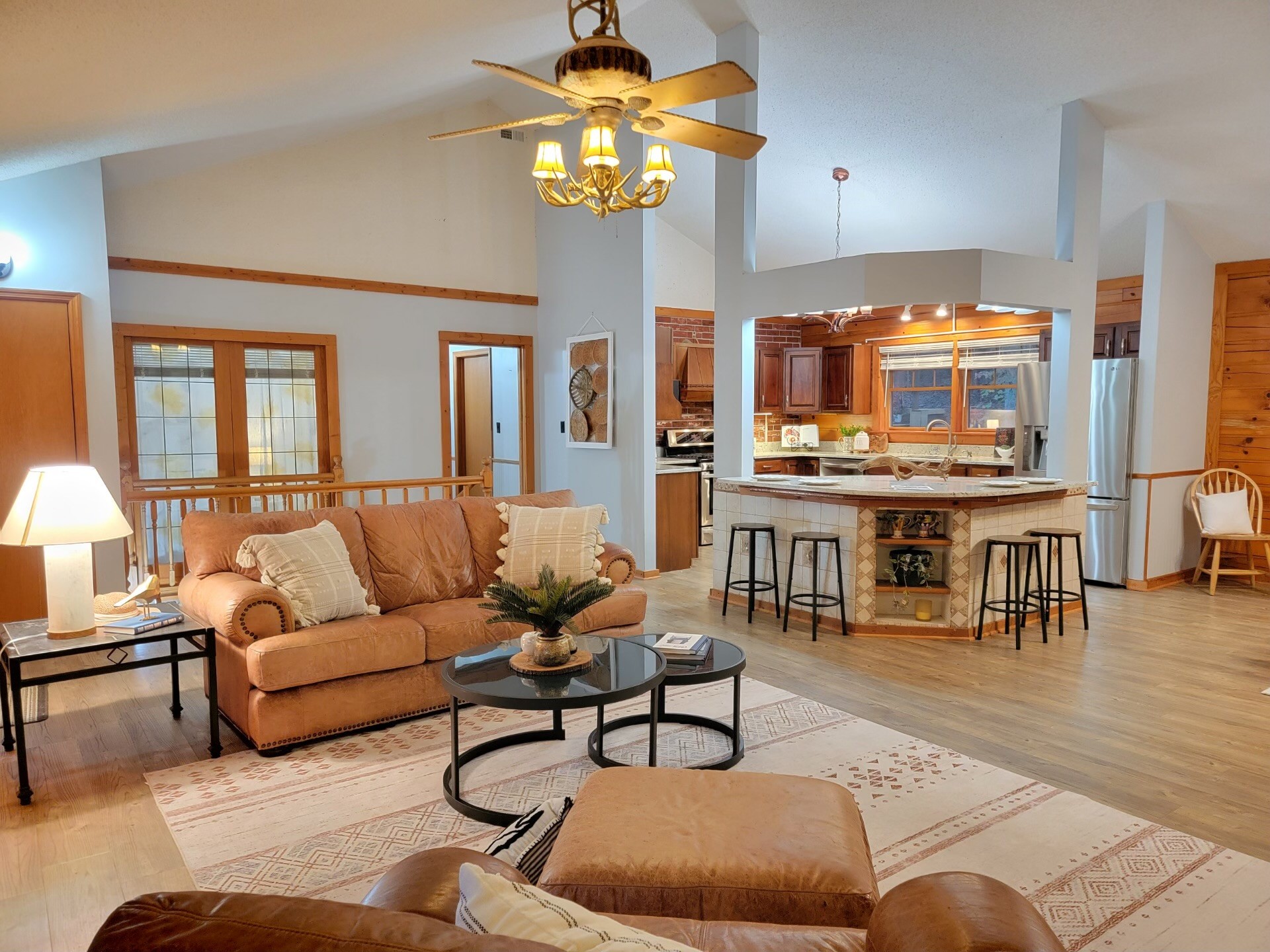 1006 Sullivan Drive White Bluff, TN 37187 - Photo 14 of 46 a living room with furniture kitchen view and a chandelier