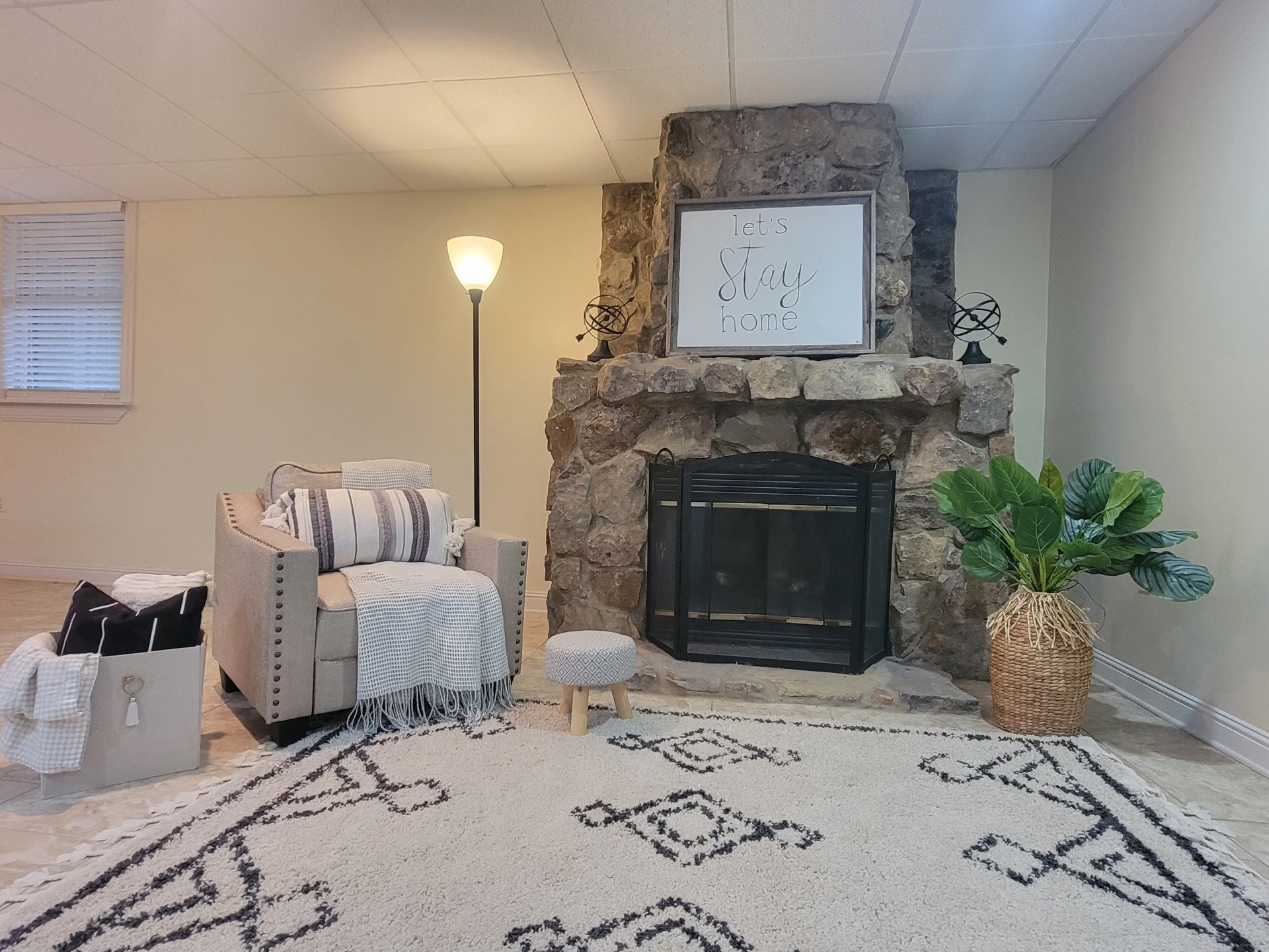 1006 Sullivan Drive White Bluff, TN 37187 - Photo 24 of 46 a living room with furniture potted plant and a fireplace