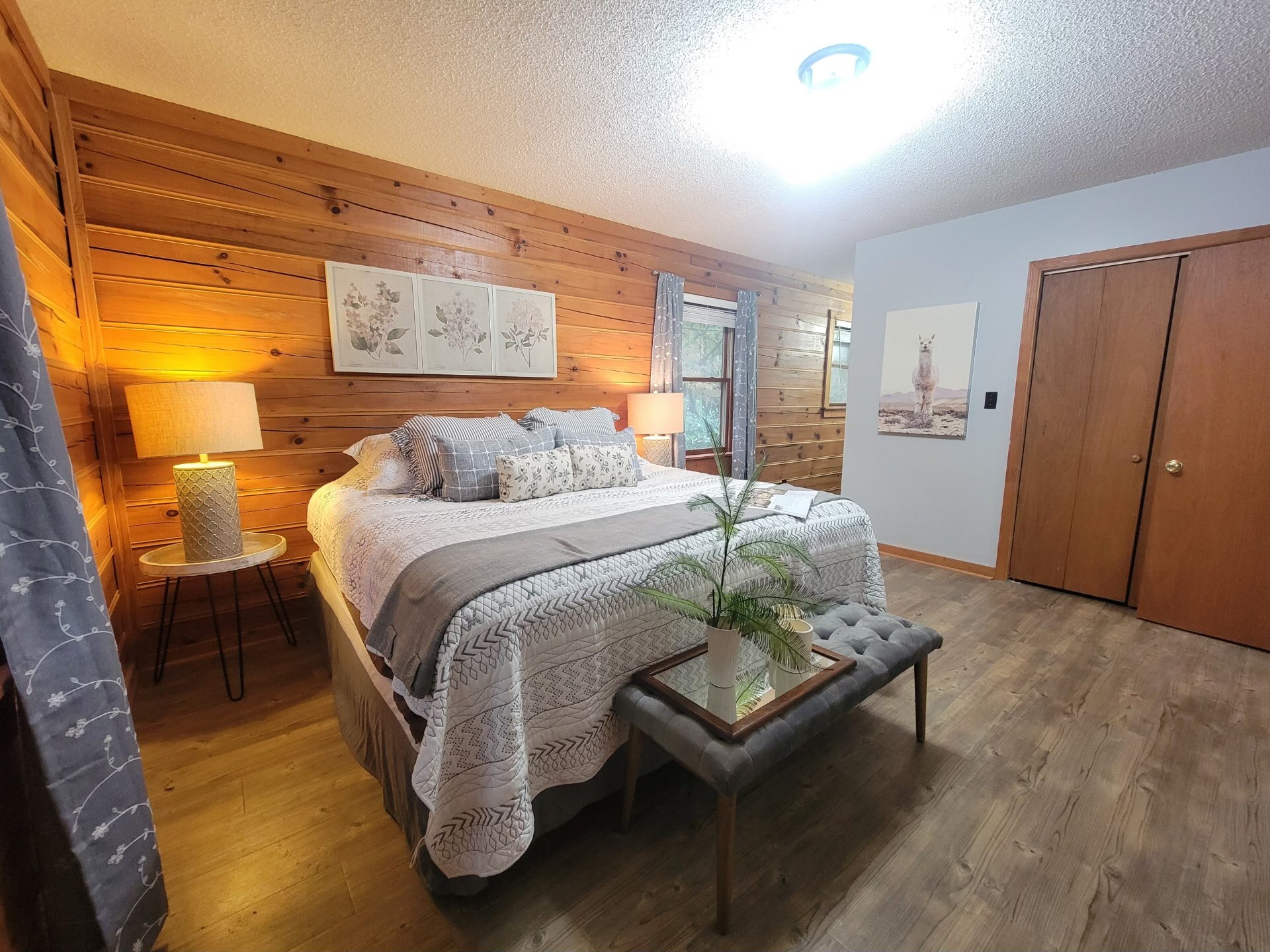 1006 Sullivan Drive White Bluff, TN 37187 - Photo 32 of 46 a bedroom with a bed and wooden floor
