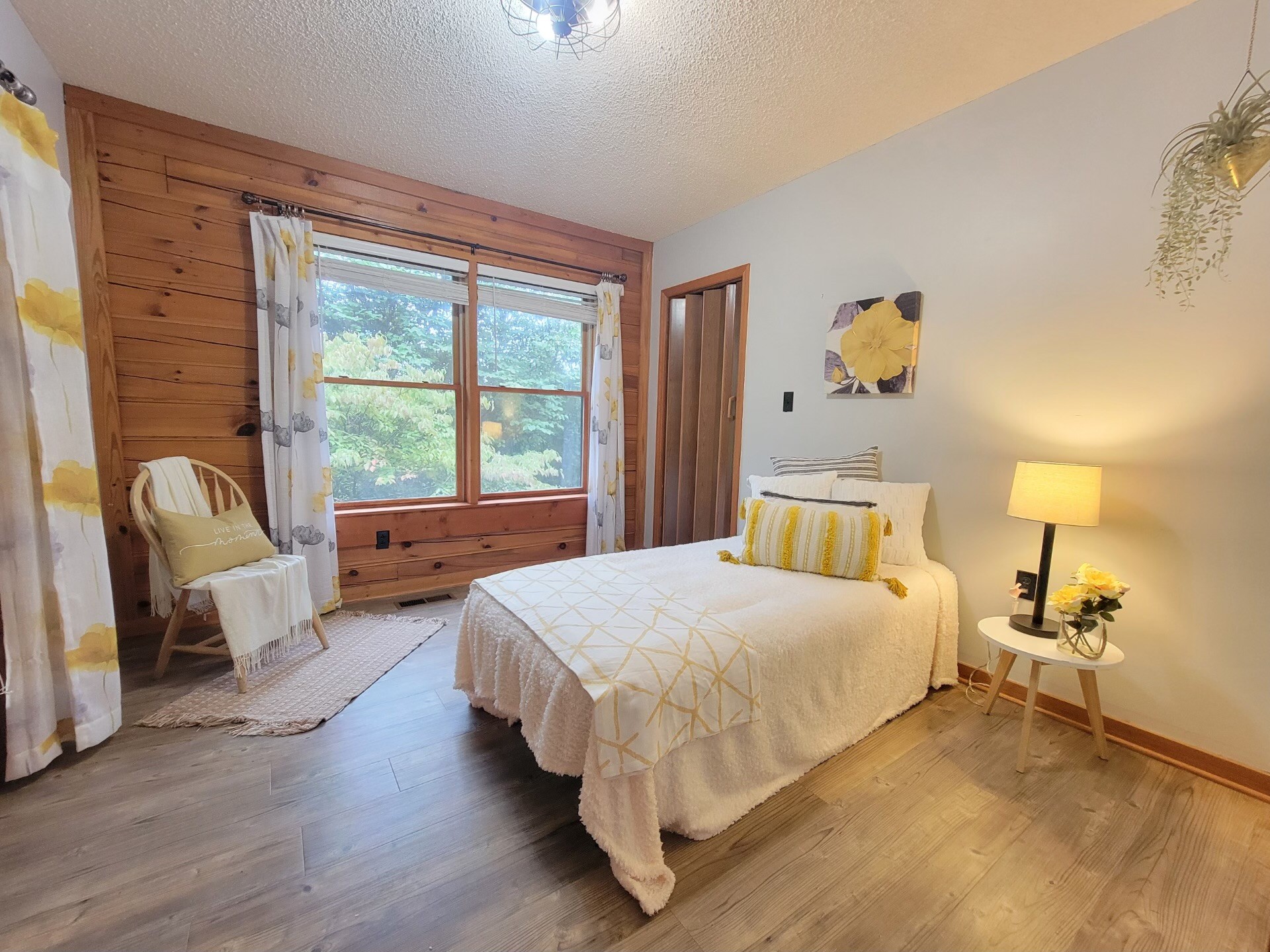 1006 Sullivan Drive White Bluff, TN 37187 - Photo 35 of 46 a bedroom with a bed and wooden floor