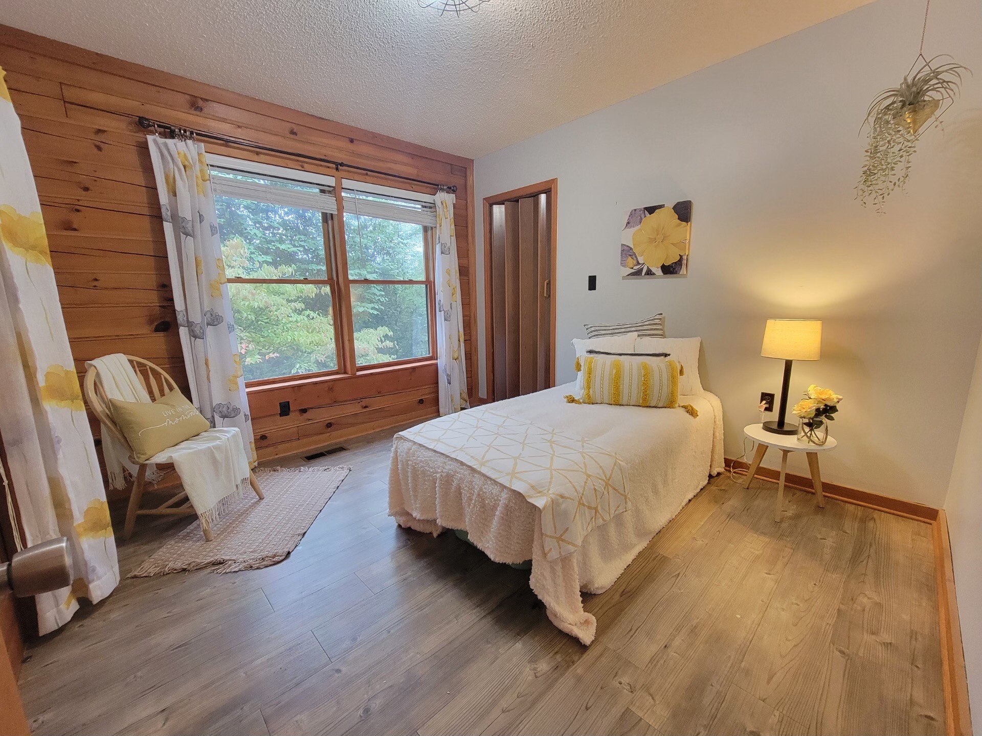 1006 Sullivan Drive White Bluff, TN 37187 - Photo 36 of 46 a spacious bedroom with a bed and wooden floor
