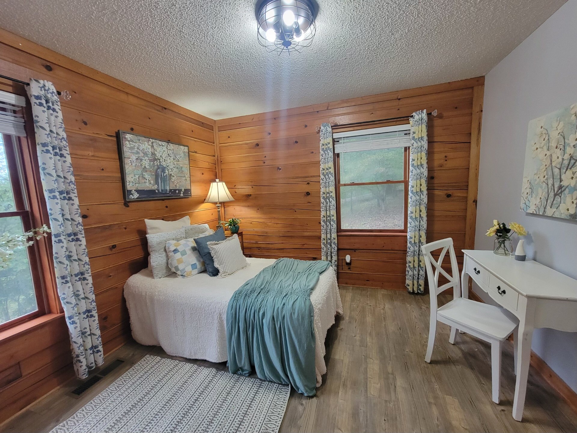 1006 Sullivan Drive White Bluff, TN 37187 - Photo 37 of 46 a bedroom with a bed and a chandelier