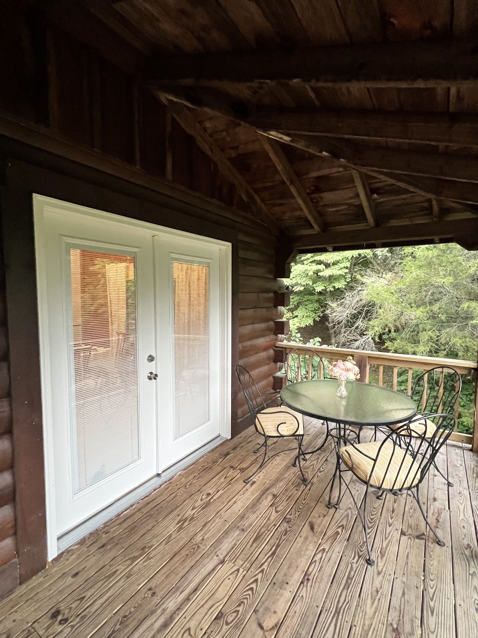 1006 Sullivan Drive White Bluff, TN 37187 - Photo 43 of 46 a view of a balcony with chairs and wooden floor