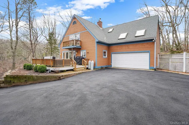 a view of house with outdoor space and porch