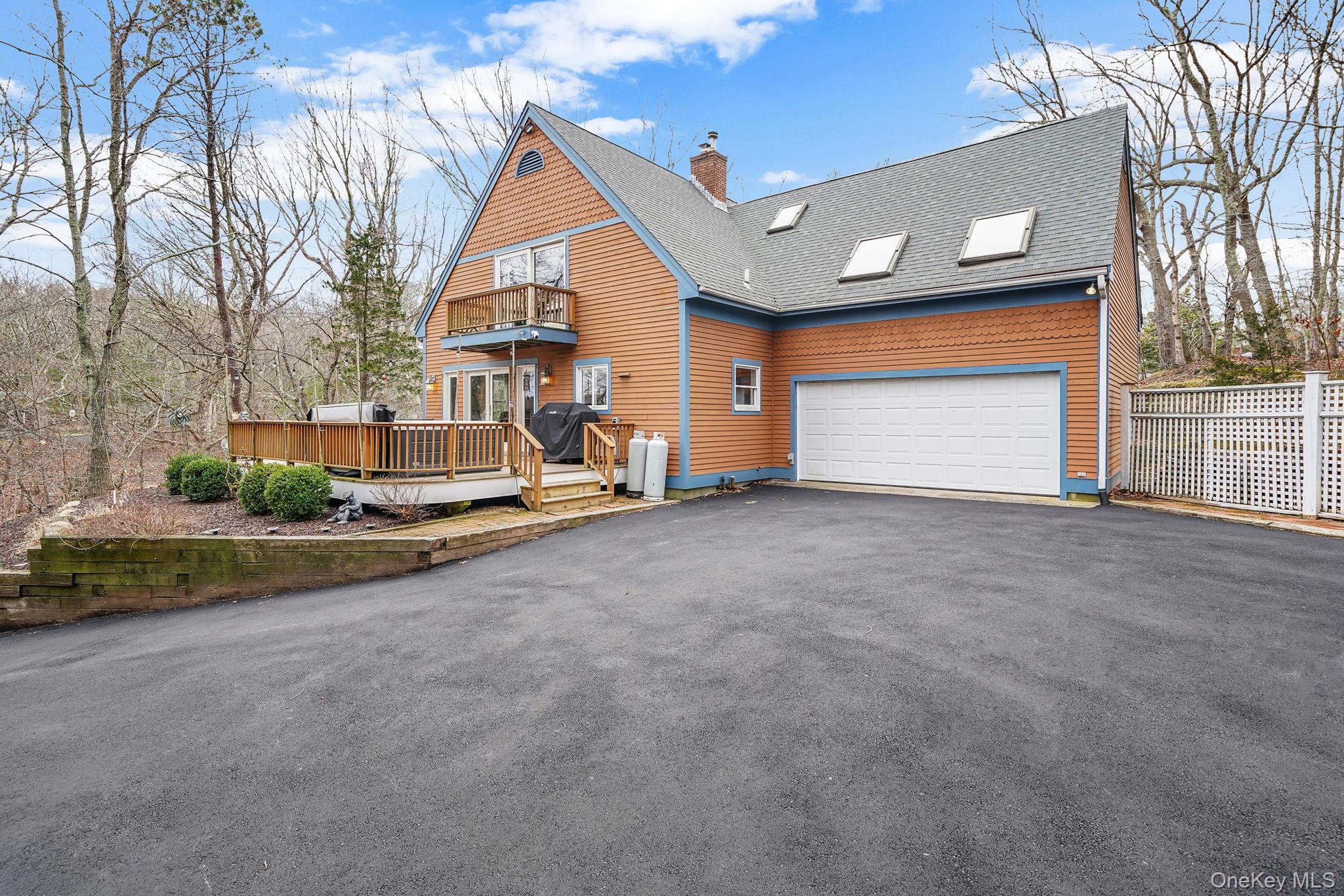 1745 Bay View Avenue Mattituck, NY 11952 - Photo 3 of 37 a view of house with outdoor space and porch