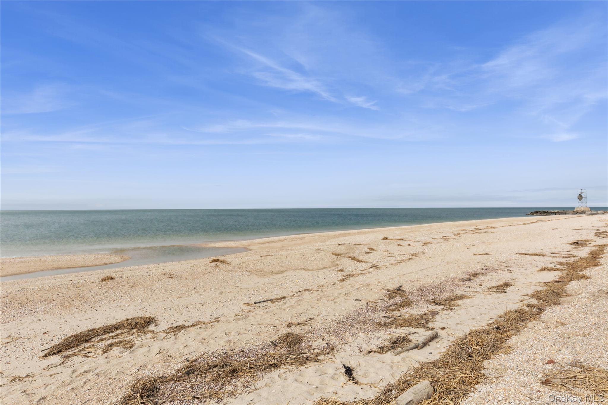 1745 Bay View Avenue Mattituck, NY 11952 - Photo 35 of 37 a view of beach and ocean