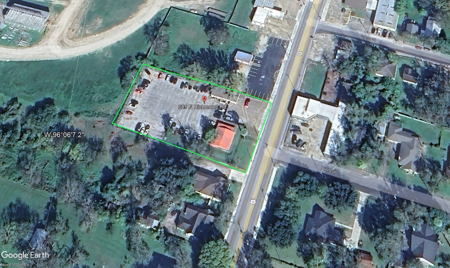an aerial view of a residential houses with outdoor space