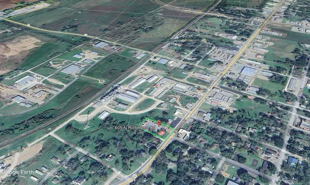 a picture of door with a dry ground