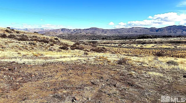 a view of ocean with mountain