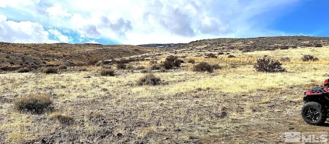 a view of mountain view with mountains in the background