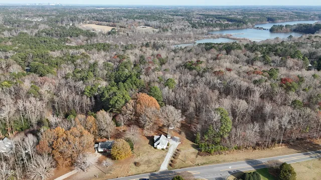 a backyard of apartments with large trees