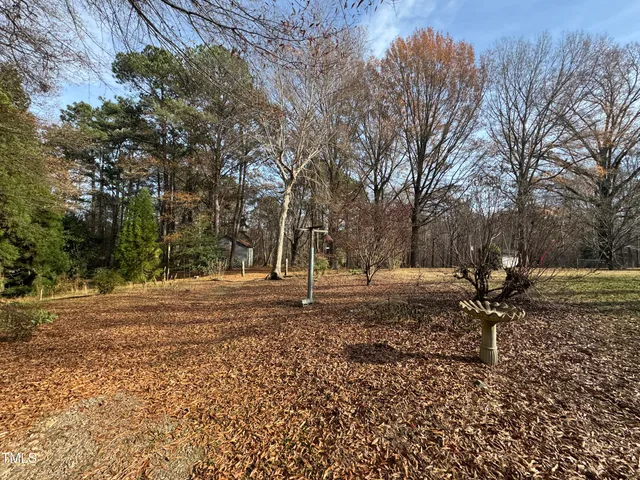 a house with trees in front of it