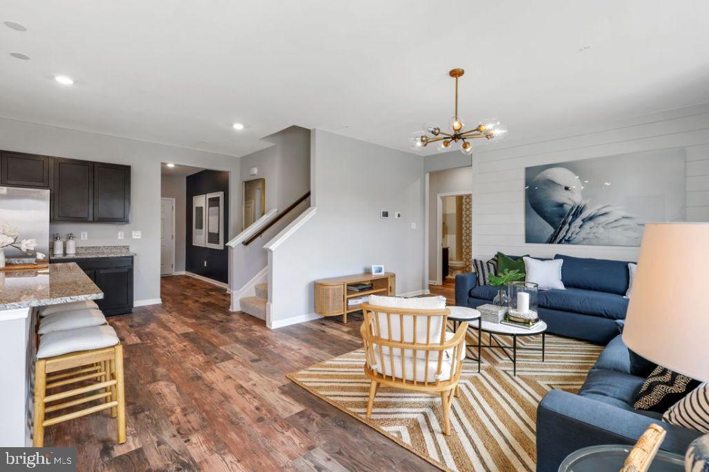 92 Open Gate Lane Shepherdstown, WV 25443 - Photo 18 of 40 a living room with furniture and a chandelier