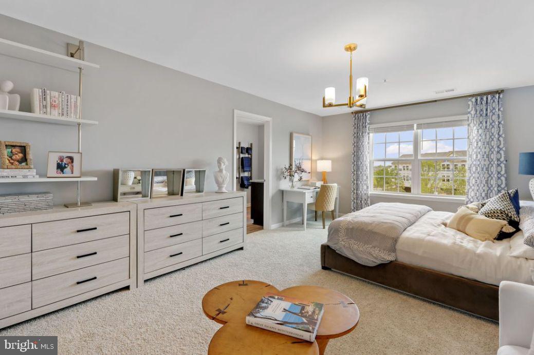 92 Open Gate Lane Shepherdstown, WV 25443 - Photo 22 of 40 a spacious bedroom with a bed window and a dresser in it