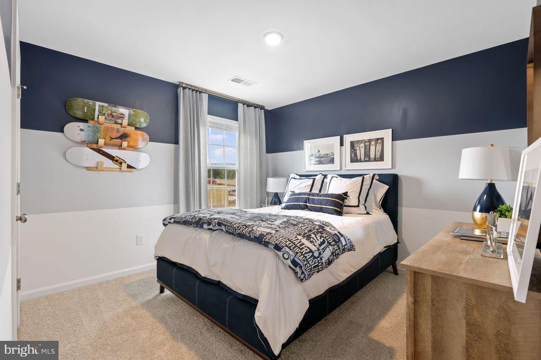 92 Open Gate Lane Shepherdstown, WV 25443 - Photo 31 of 40 a bedroom with bed and painting on the wall