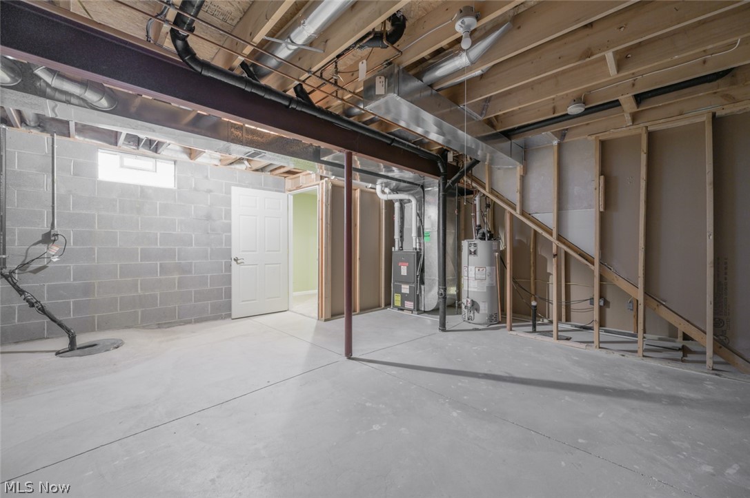 1060 Susan Road Ravenna, OH 44266 - Photo 22 of 25 Basement with heating utilities and gas water heater