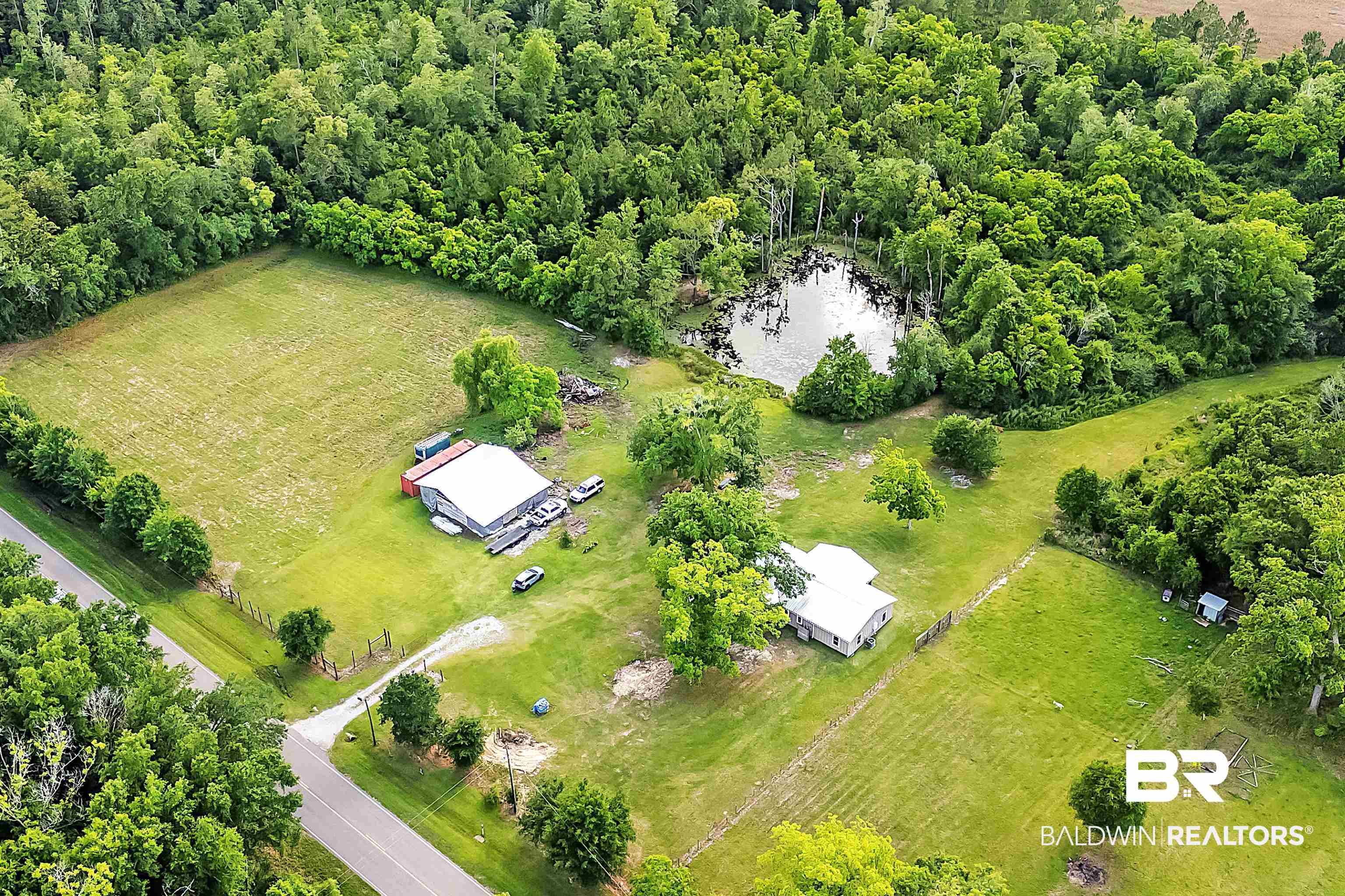 Aerial view of sparsely populated area with a nearby body of water