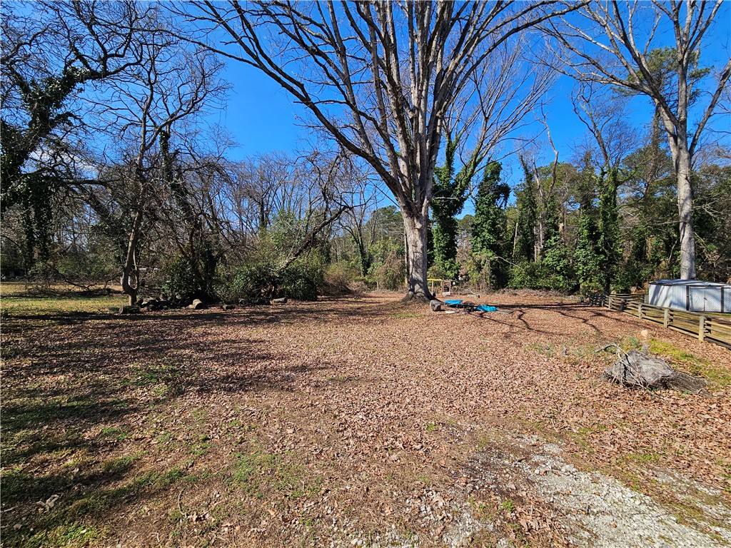 237 Pine Lane Anderson, SC 29621 - Photo 6 of 23 A spacious lot provides a blank canvas for your dream property, surrounded by mature trees.