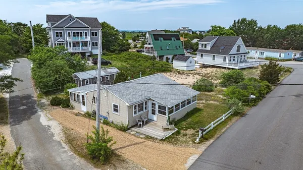 an aerial view of a house with a garden