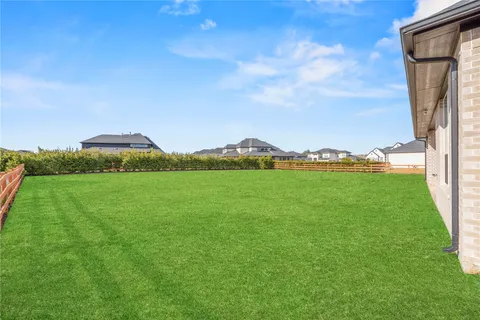 a view of a garden and basketball court