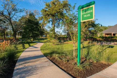 a view of swimming pool with a yard