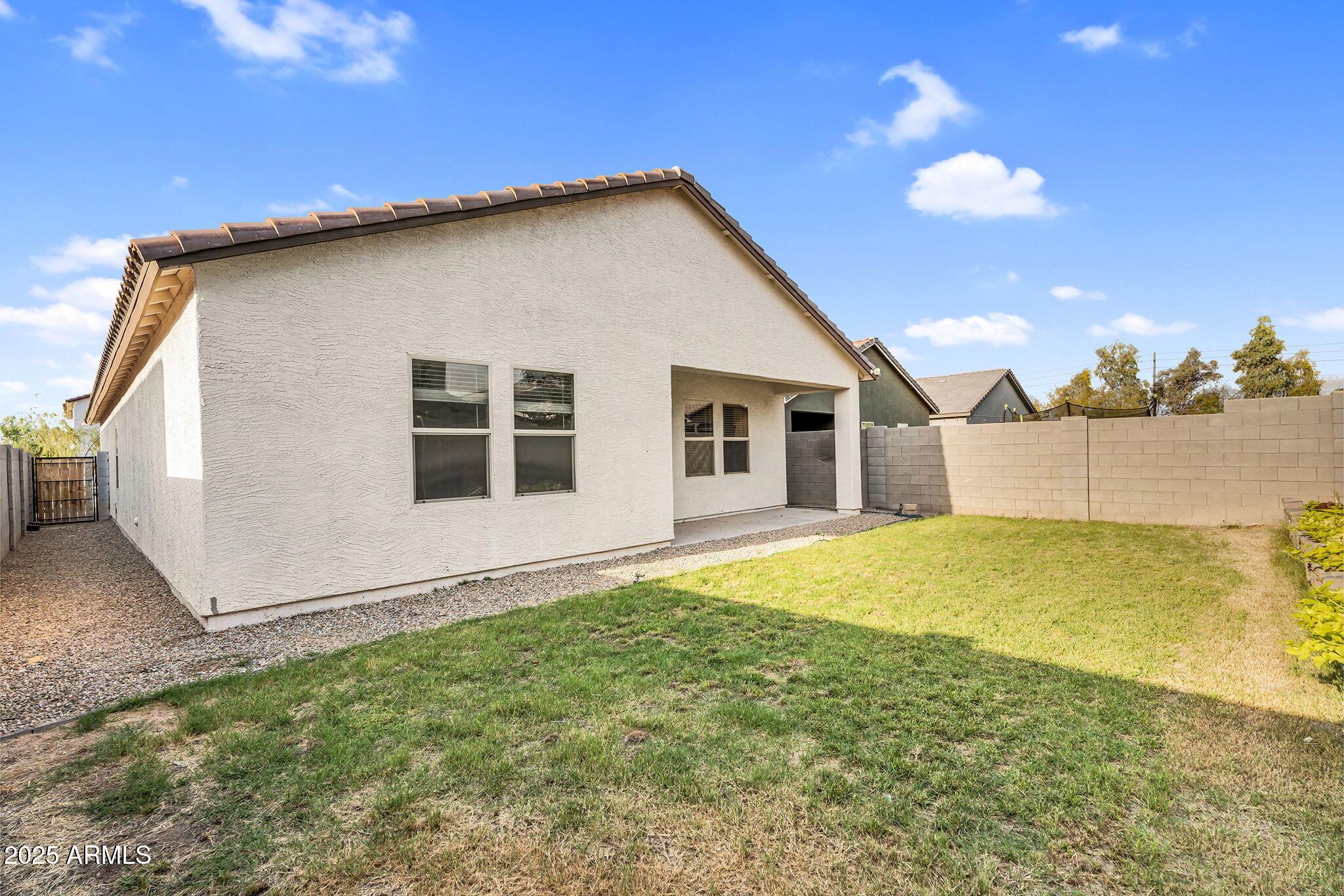 6113 East Athena Road Florence, AZ 85132 - Photo 16 of 19 a view of a house with backyard and garden