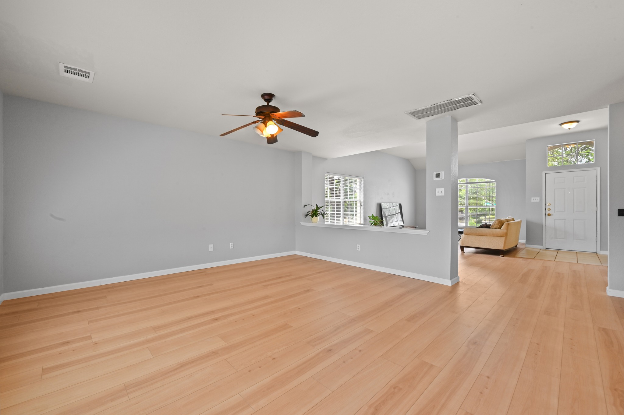 2700 Cradlerock Terrace Austin, TX 78748 - Photo 10 of 29 a view of livingroom with hardwood floor and a ceiling fan