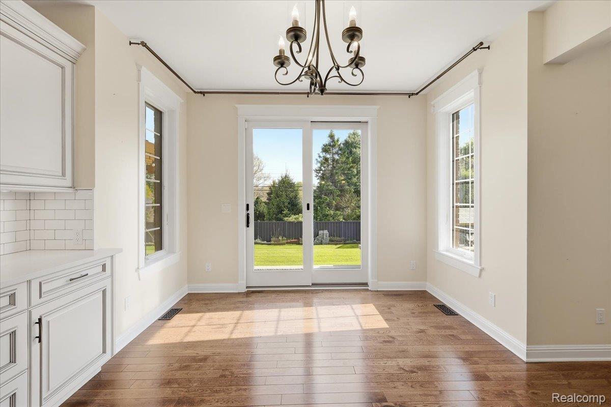 35339 West 13 Mile Road Farmington, MI 48331 - Photo 14 of 72 Unfurnished dining area with suspended lighting and light wood finished floors
