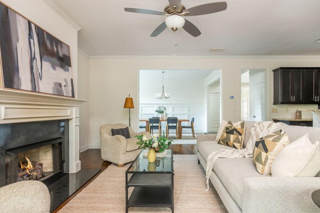 371 Hooper Street Southeast Atlanta, GA 30317 - Photo 11 of 29 a living room with furniture and a fireplace