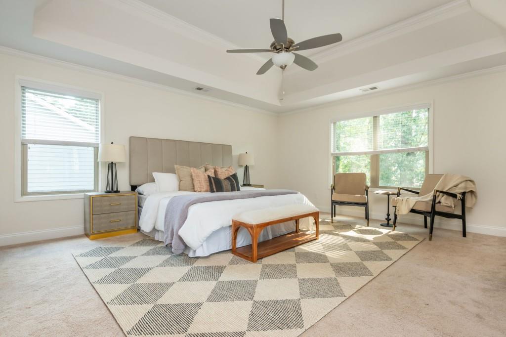 371 Hooper Street Southeast Atlanta, GA 30317 - Photo 18 of 29 a bedroom with a bed a lamp and a large window